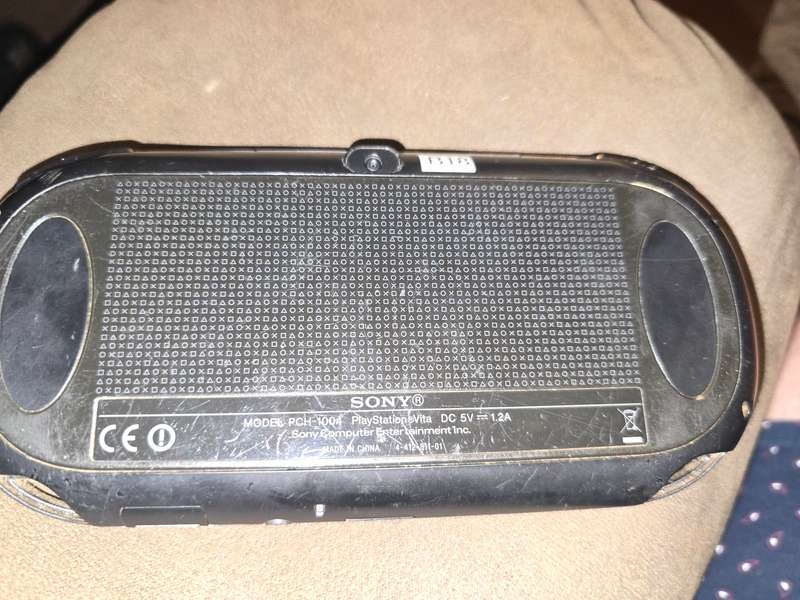 PS Vita Console - with 64gb memory card - some scuffing on back and front