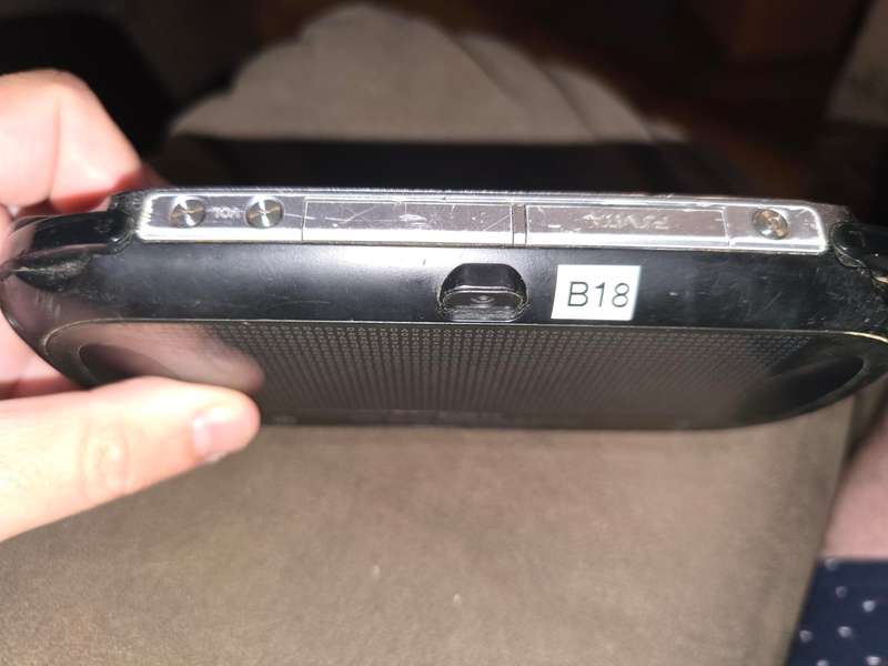 PS Vita Console - with 64gb memory card - some scuffing on back and front