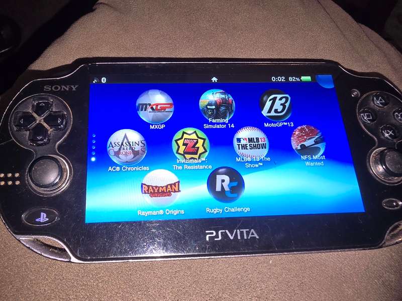 PS Vita Console - with 64gb memory card - some scuffing on back and front