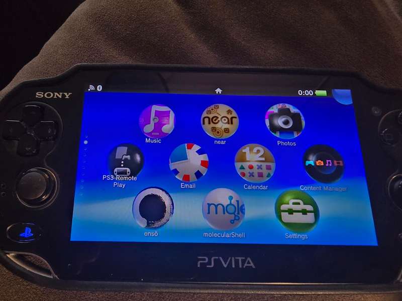 PS Vita 1000 Console (B08) - Excellent condition with cover, lots of games loaded, 128gb
