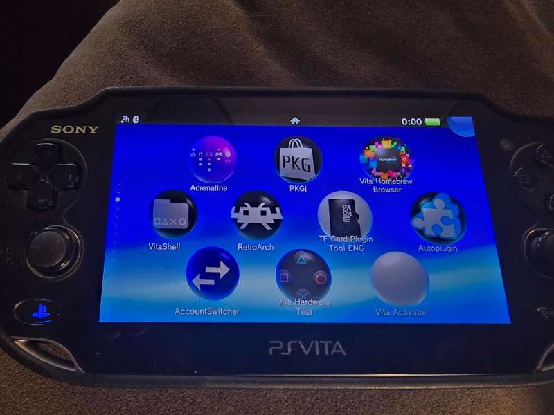 PS Vita 1000 Console (B08) - Excellent condition with cover, lots of games loaded, 128gb
