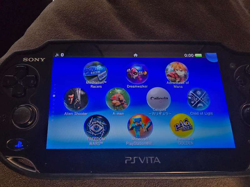 PS Vita 1000 Console (B08) - Excellent condition with cover, lots of games loaded, 128gb