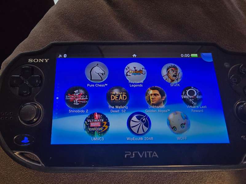 PS Vita 1000 Console (B08) - Excellent condition with cover, lots of games loaded, 128gb