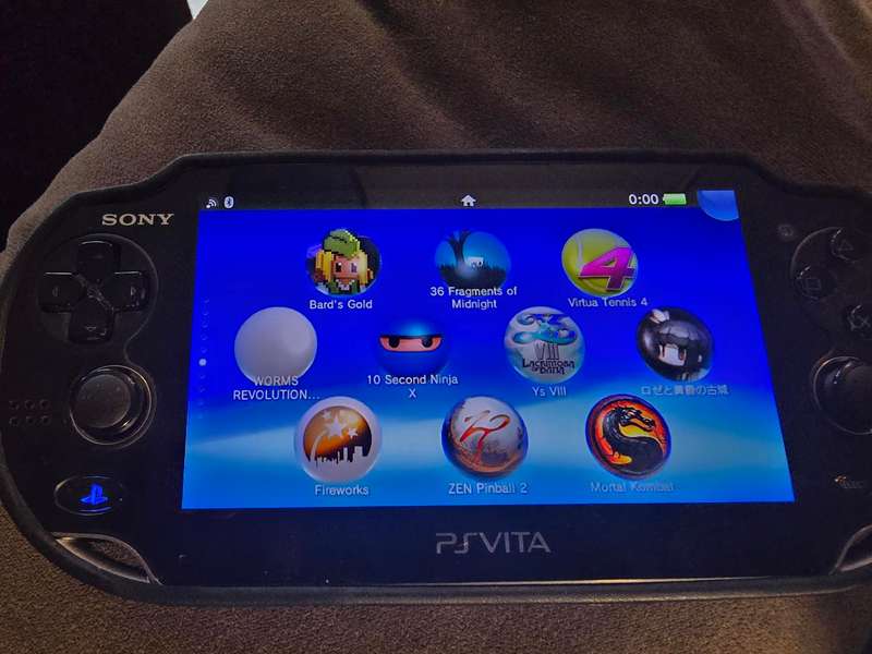 PS Vita 1000 Console (B08) - Excellent condition with cover, lots of games loaded, 128gb