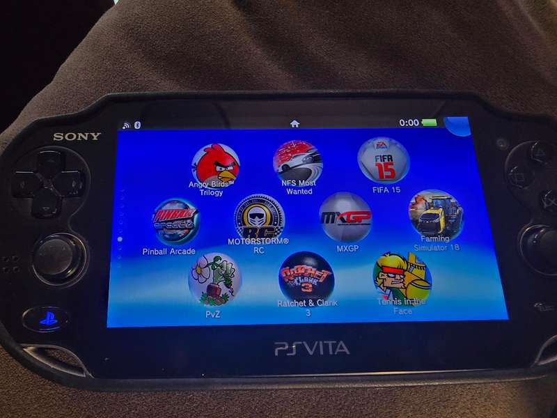 PS Vita 1000 Console (B08) - Excellent condition with cover, lots of games loaded, 128gb