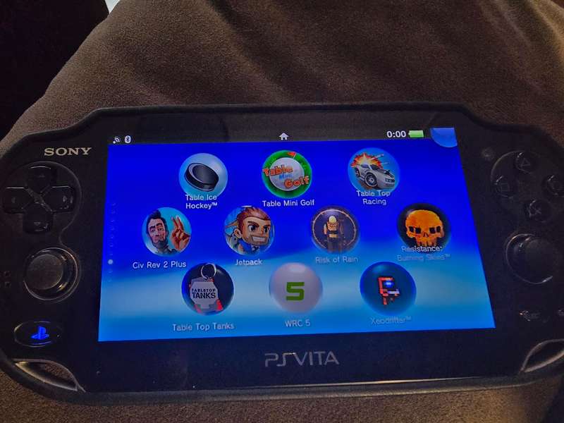 PS Vita 1000 Console (B08) - Excellent condition with cover, lots of games loaded, 128gb