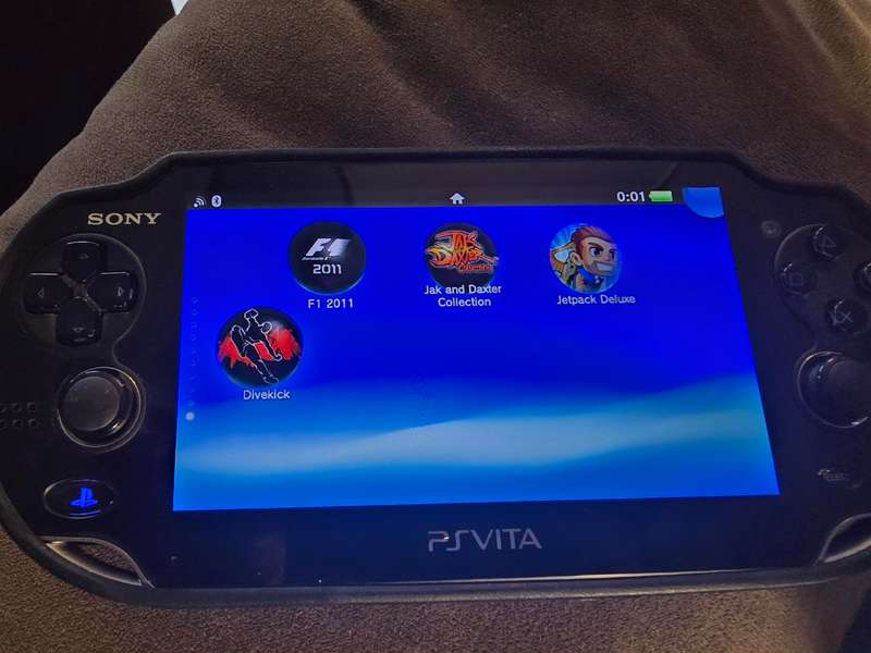 PS Vita 1000 Console (B08) - Excellent condition with cover, lots of games loaded, 128gb