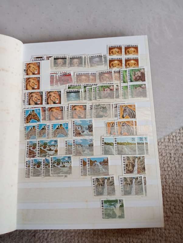 SCARCE ZIMBABWE COLLECTION IN STOCK BOOK-MANY HIGH VALUE BLOCKS ETC
