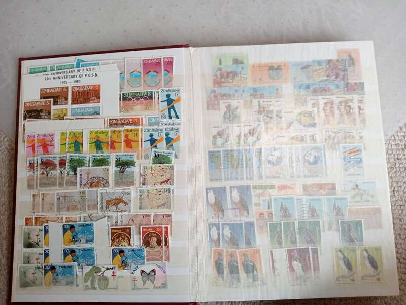 SCARCE ZIMBABWE COLLECTION IN STOCK BOOK-MANY HIGH VALUE BLOCKS ETC