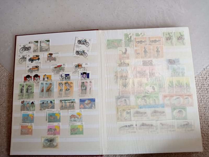 SCARCE ZIMBABWE COLLECTION IN STOCK BOOK-MANY HIGH VALUE BLOCKS ETC