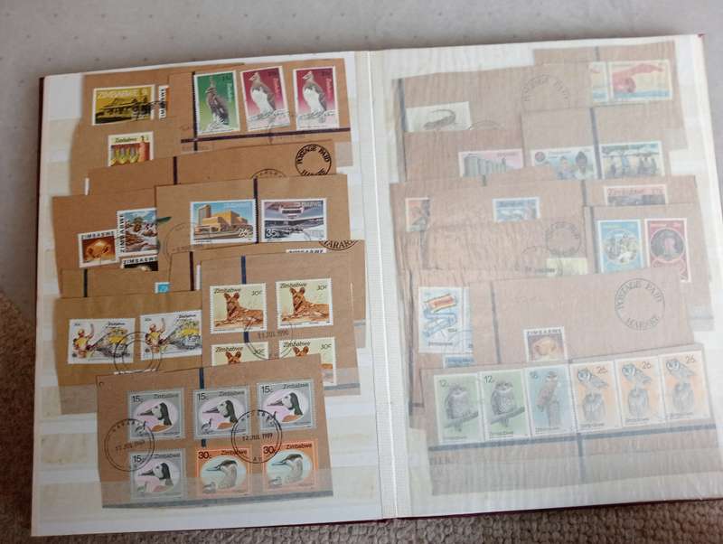 SCARCE ZIMBABWE COLLECTION IN STOCK BOOK-MANY HIGH VALUE BLOCKS ETC
