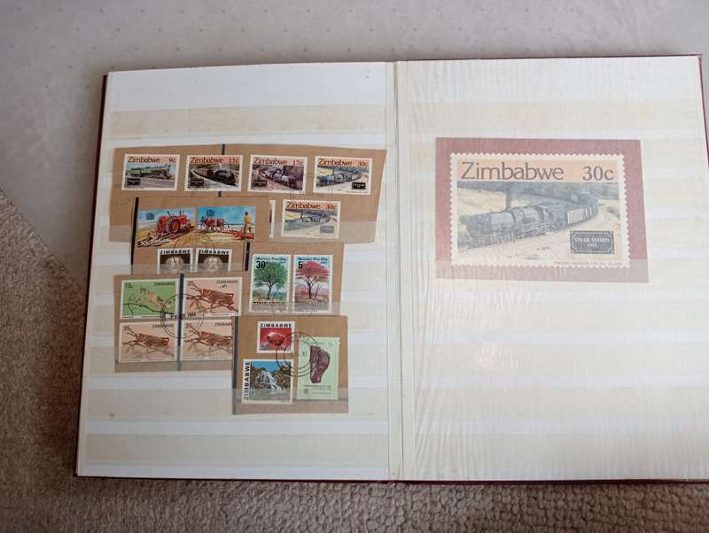 SCARCE ZIMBABWE COLLECTION IN STOCK BOOK-MANY HIGH VALUE BLOCKS ETC