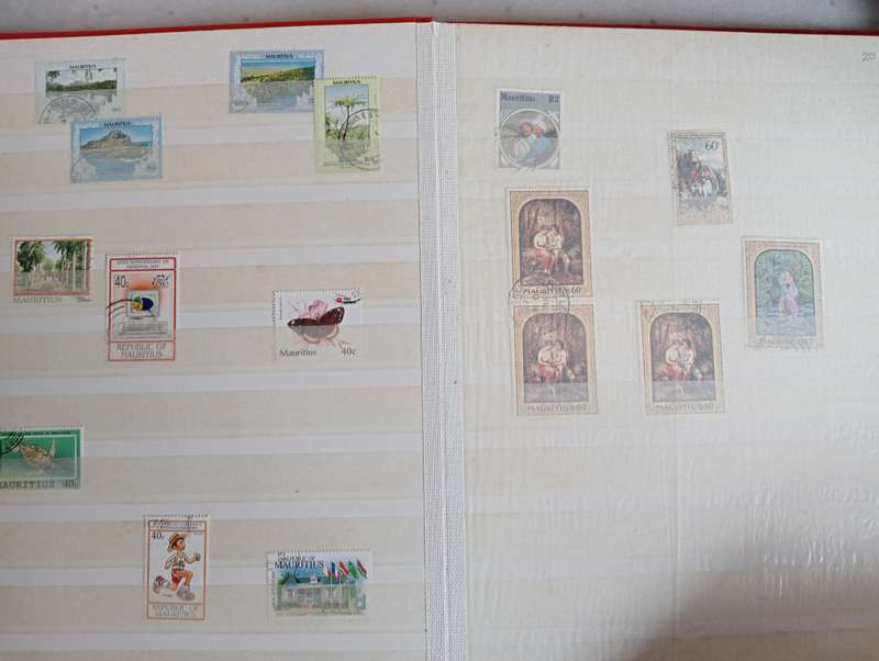 MAURITIUS AND SEYCHELLES IN A STOCK BOOK-MANY EARLY USEFUL,KGVI SEYCHELLES HAS TONING -CONDITION ISS