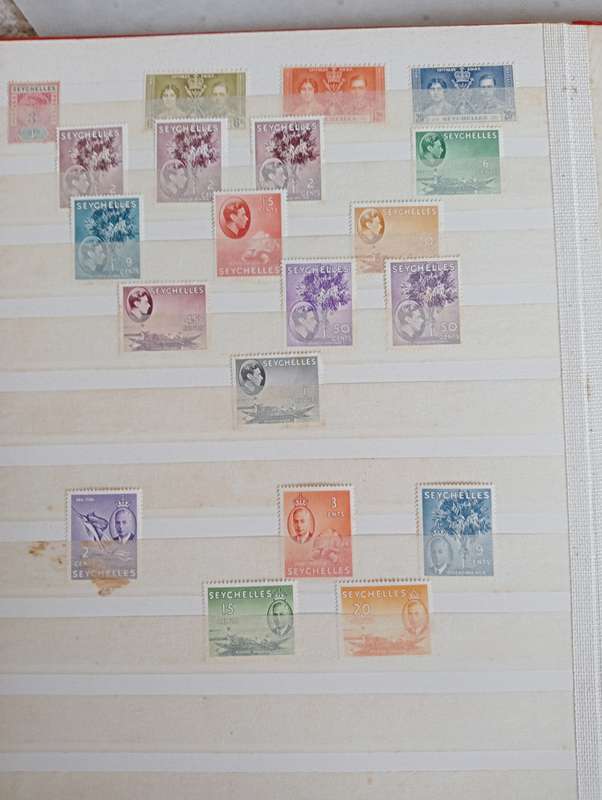 MAURITIUS AND SEYCHELLES IN A STOCK BOOK-MANY EARLY USEFUL,KGVI SEYCHELLES HAS TONING -CONDITION ISS