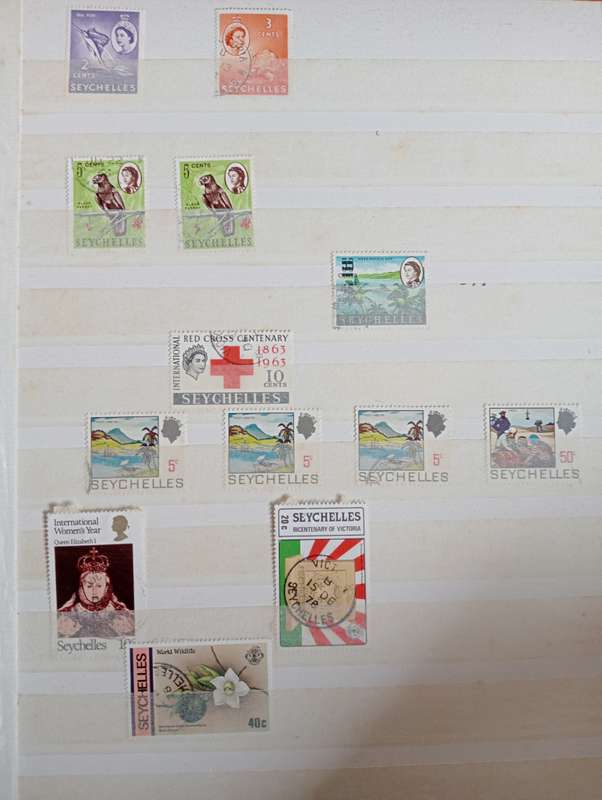 MAURITIUS AND SEYCHELLES IN A STOCK BOOK-MANY EARLY USEFUL,KGVI SEYCHELLES HAS TONING -CONDITION ISS