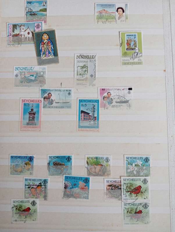 MAURITIUS AND SEYCHELLES IN A STOCK BOOK-MANY EARLY USEFUL,KGVI SEYCHELLES HAS TONING -CONDITION ISS