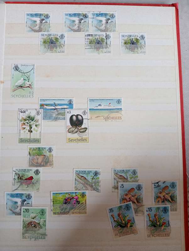 MAURITIUS AND SEYCHELLES IN A STOCK BOOK-MANY EARLY USEFUL,KGVI SEYCHELLES HAS TONING -CONDITION ISS