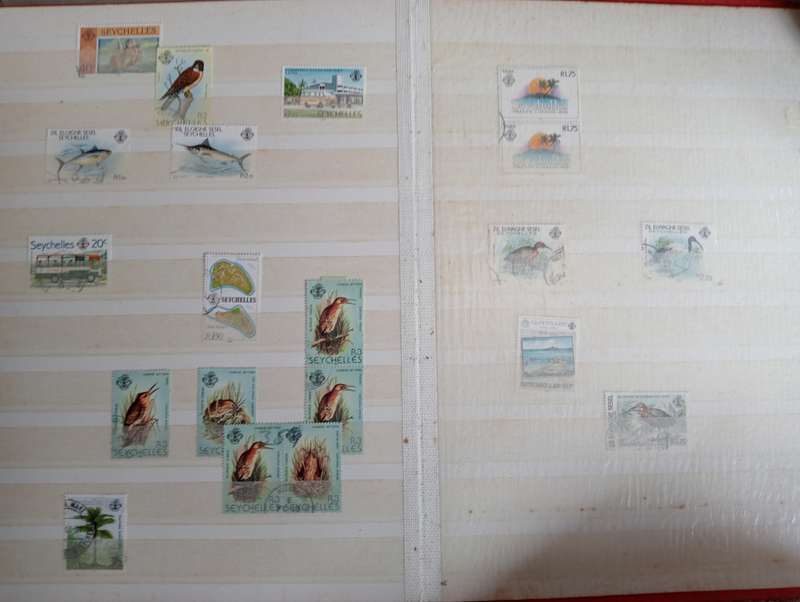 MAURITIUS AND SEYCHELLES IN A STOCK BOOK-MANY EARLY USEFUL,KGVI SEYCHELLES HAS TONING -CONDITION ISS
