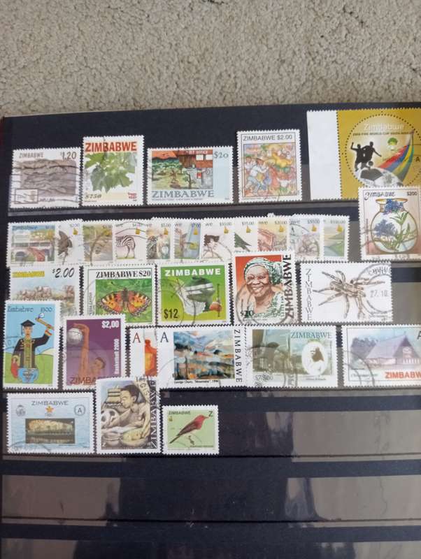 ENORMOUS COLLECTION IN STOCK BOOK EARLY AUST.N.ZEALAND AND OTHERS 100`S SEE BELOW