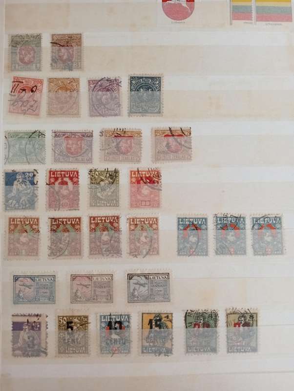 STOCK BOOK WITH GOOD EARLY LATVIA,LITHUANIA AND ESSTI-MUST SEE MANY PAGES BELOW