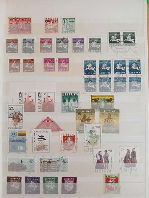STOCK BOOK WITH GOOD EARLY LATVIA,LITHUANIA AND ESSTI-MUST SEE MANY PAGES BELOW