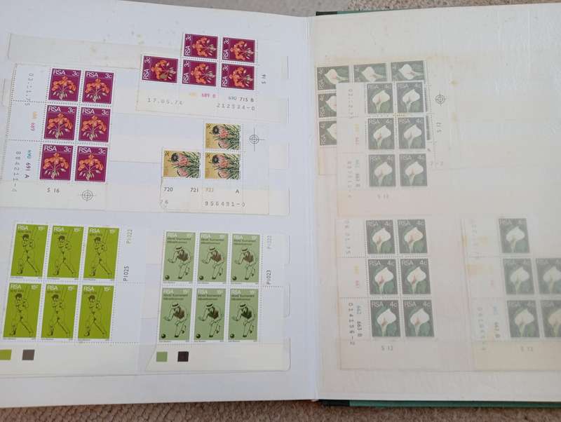 TWO stockbooks with some CLEAN SWA wars + coronation mint,others MOST of Union has degrees of toning