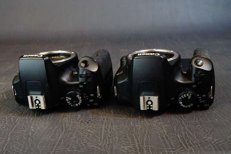 2 x Canon EOS 1000D Digital SLR Camera Bodies  **NON FUNCTIONAL SPARES OR REPAIR**