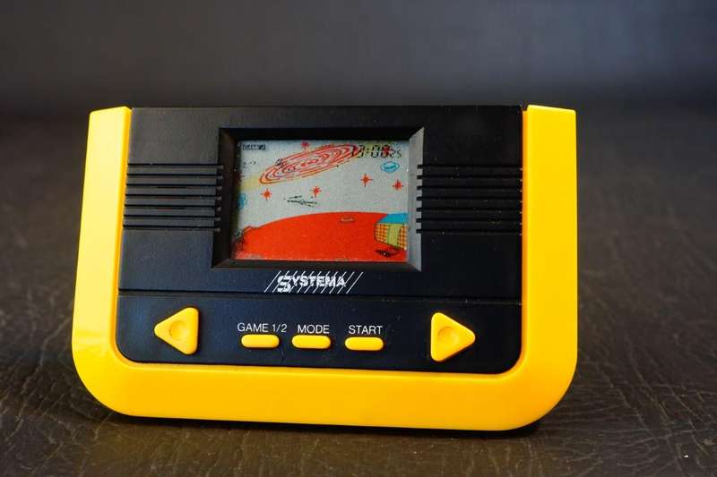 Vintage Systema Spaceman LCD Handheld Electronic Game With Stand Vintage 1990s **Great Condition**