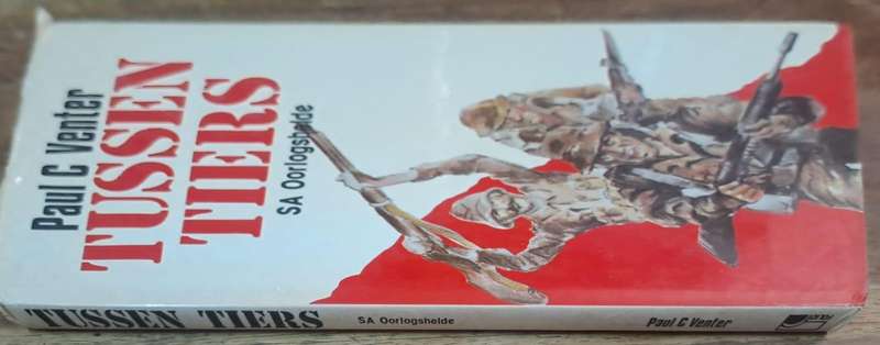 Tussen tiers SA oorlogshelde - Paul C Venter (Hard cover with dj)