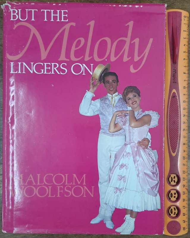 But the Melody lingers on - Malcolm Woolfson (Hard cover with dj)
