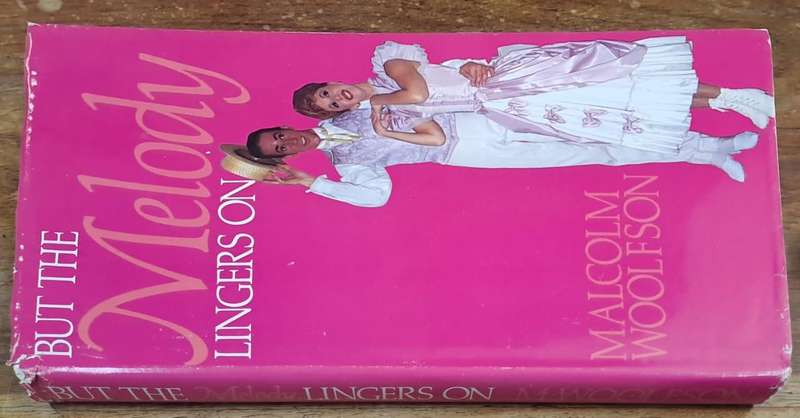 But the Melody lingers on - Malcolm Woolfson (Hard cover with dj)