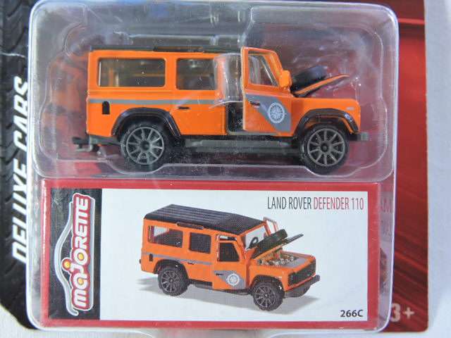 Majorette LAND ROVER Defender 110 MIB ( Orange ) With moving parts. Like Hot Wheels