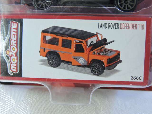 Majorette LAND ROVER Defender 110 MIB ( Orange ) With moving parts. Like Hot Wheels