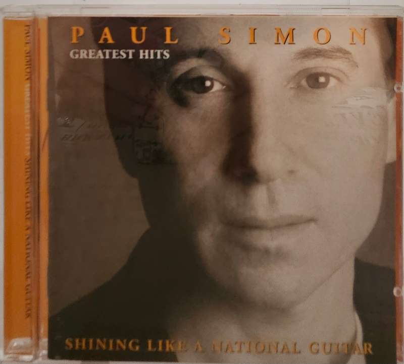 Paul Simon Greatest Hits Shining like a natural guitar  (3513)