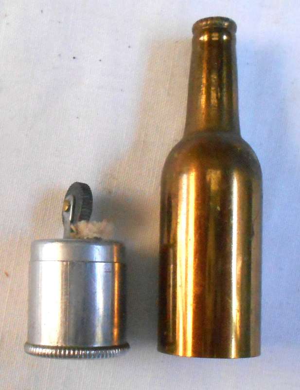 STUNNING MINIATURE SWAN LAGER BOTTLE WITH LIGHTER INSIDE BOTTLE