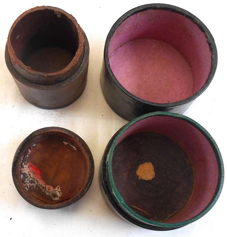 TWO ANTIQUE SMALL LEATHER ROUNDJEWELLERY BOXES