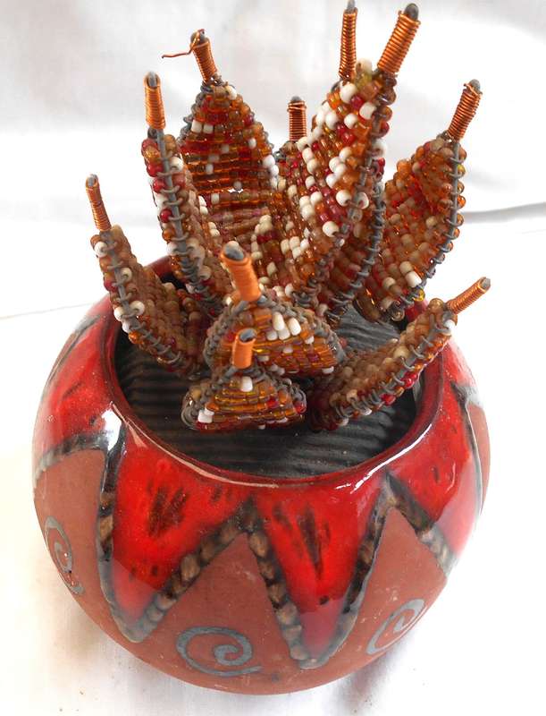 STUNNING BEADED FLOWERING ALOES IN DECORATED ROUND CLAY POT