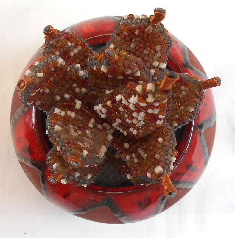 STUNNING BEADED FLOWERING ALOES IN DECORATED ROUND CLAY POT