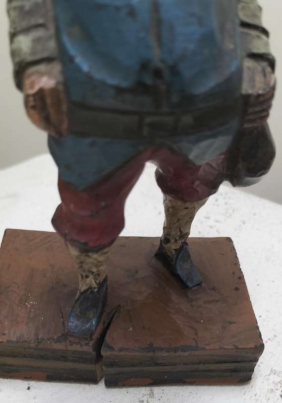 Vintage European wood carving - Sancho Panza standing on book