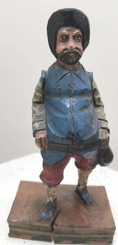Vintage European wood carving - Sancho Panza standing on book