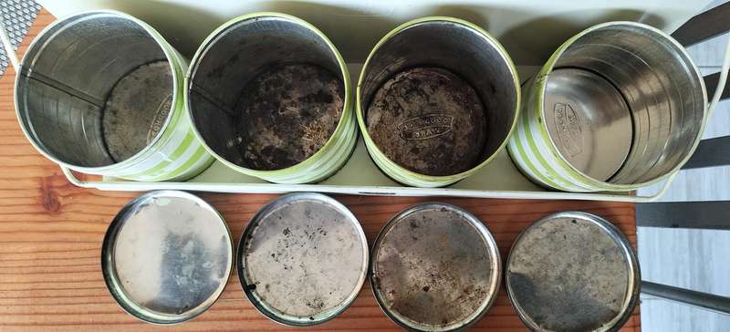 Set of Goodhope Ware kitchen canisters with metal shelve