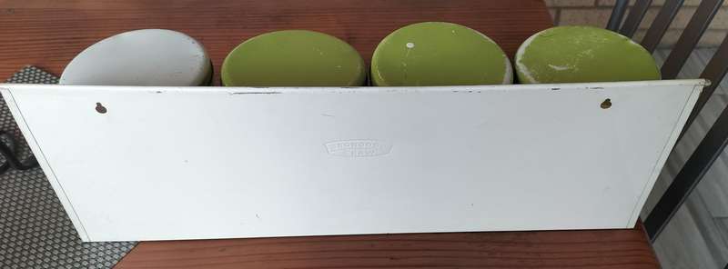 Set of Goodhope Ware kitchen canisters with metal shelve