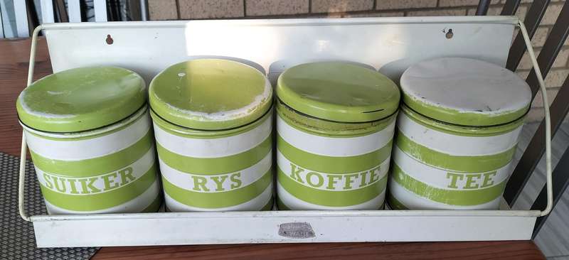 Set of Goodhope Ware kitchen canisters with metal shelve
