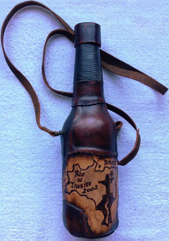 Leather-covered bottle with leather strap Rio de Janeiro 2002  Excellent condition  Rio de Janeiro 2