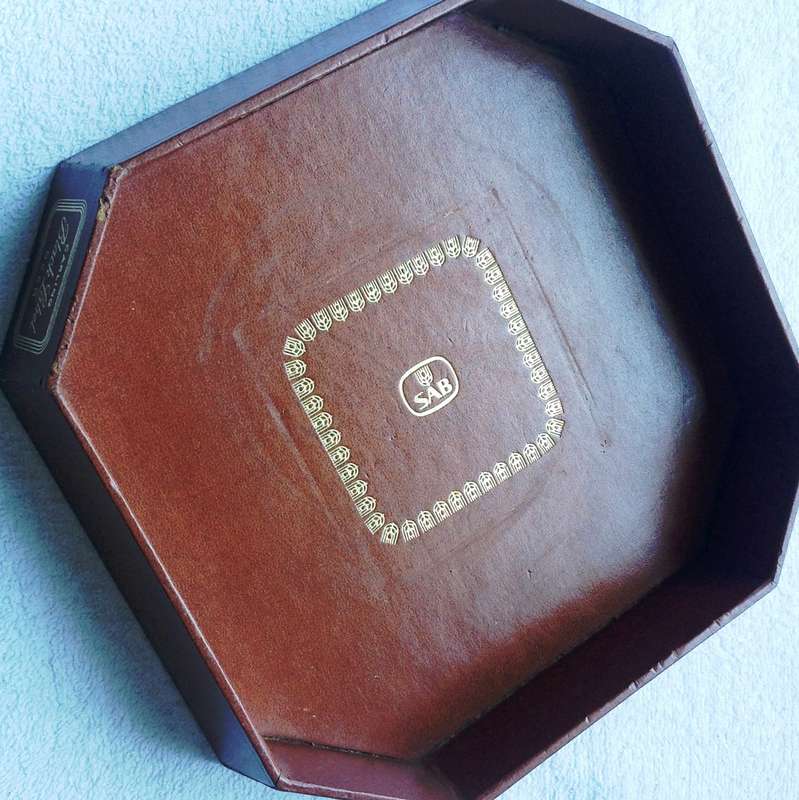 SAB branded gold-embossed bar accessory - tray