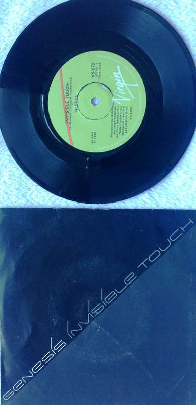 Seven single vinyl record - 45 RPM - Genesis - Invisible Touch & The Last Domino  VS 672