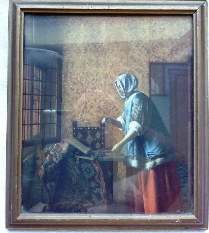 Pieter de Hooch print - Woman weighing gold and silver coins - print by The Medici Society Limited