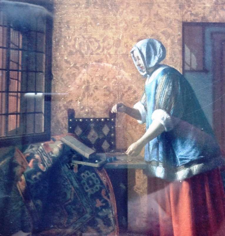 Pieter de Hooch print - Woman weighing gold and silver coins - print by The Medici Society Limited