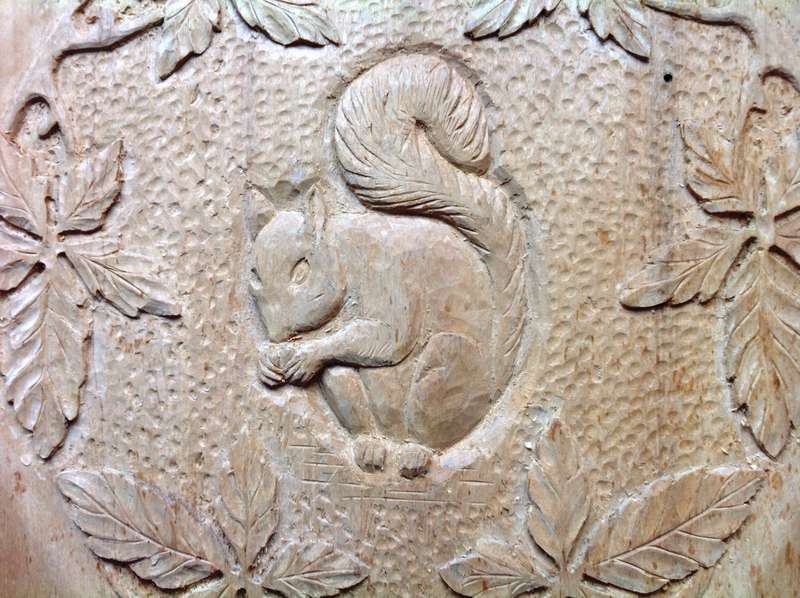 Carved Squirrel and Oak Leaves on Yellow Wood