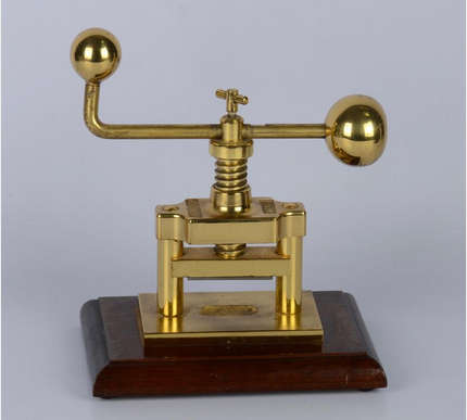 A Schaefer 20th Century brass nut press